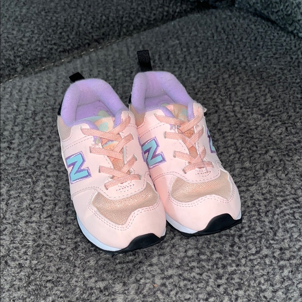 Kids New Balance pink sneakers